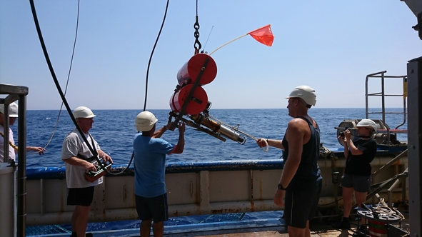 The released geodetic instrument is hoisted on deck