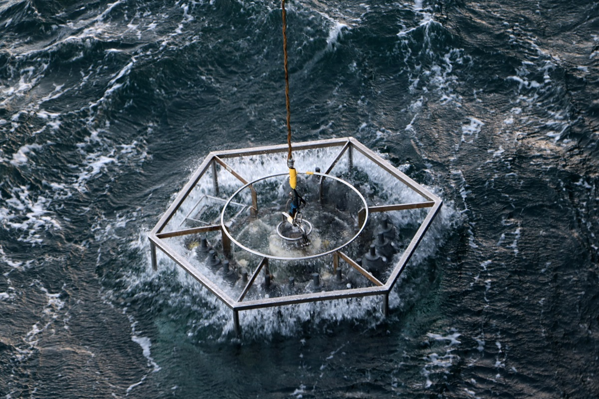 A CTD water sampler is pulled out of the frothing sea. Photo: NIOZ