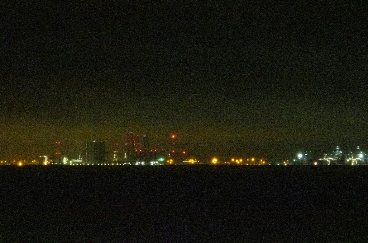 Rotterdam during a rainy night as seen from sea, photo: NIOZ