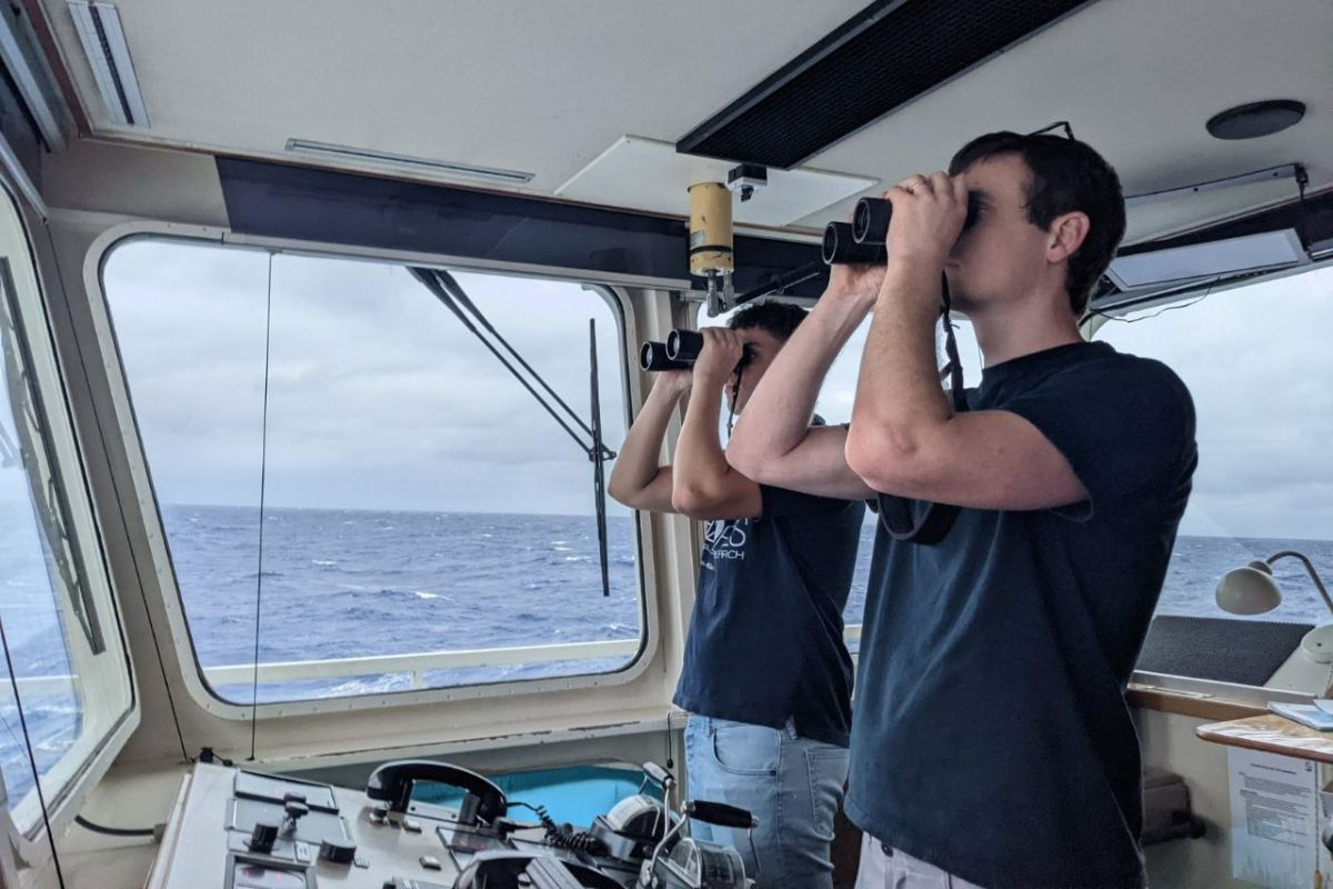 Trying to find the drifting sediment trap again for recovery. Ironically, it was first spotted by someone not using binoculars. – Photo: Ben Cala