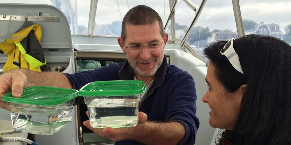 Erik and wife/collaborator Linda Amaral-Zettler checking a colonization experiment aboard sailing research vessel Sorcerer-II in Woods Hole.