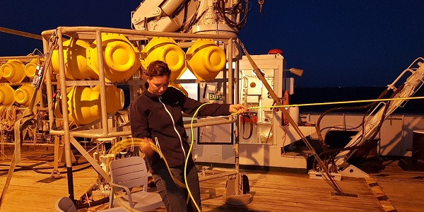 Karin slowly pulling in the sonar tow line as we survey into the shallower waters closer to the shoreline