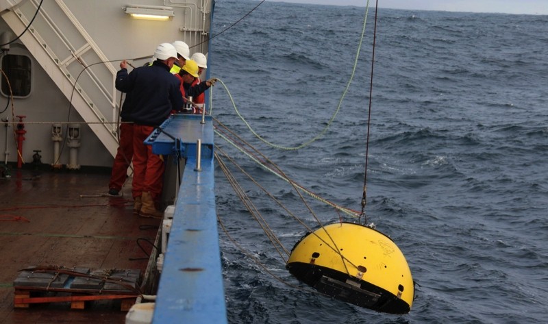 Deployment of a current profiler in a trawl-resistant frame.