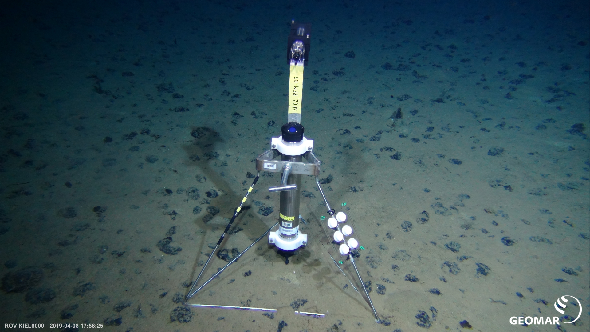 One of the NIOZ sensor platforms, recording bottom water currents and turbidity at 4100 m depth. The panel with 6 white pads attached to the frame is sampling dissolved trace metals. Photo: ROV Kiel 6000, GEOMAR.