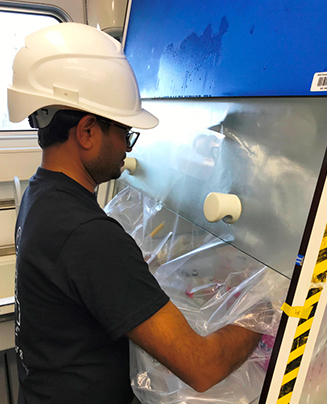 Subhash working in the lab on the RV Pelagia.jpg