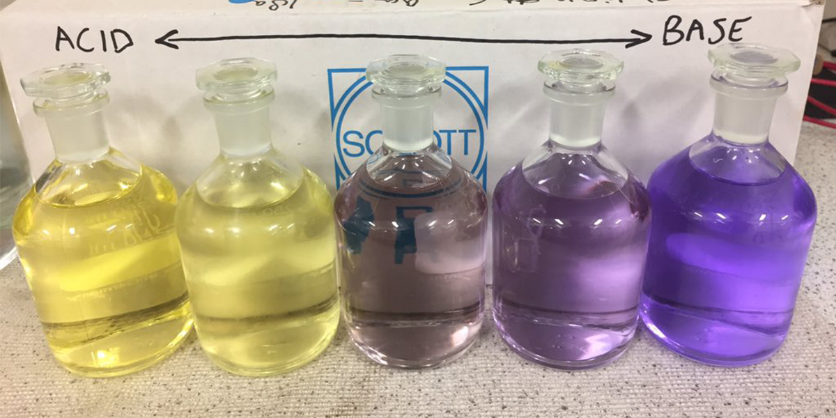 Measuring the alkalinity (i.e. CO2 storage/buffering capacity) of seawater in the Saba sinkholes on board using a spectrophotometric (i.e. colourful) titration that was previously built in house at NIOZ. Photo: Matthew Humphreys