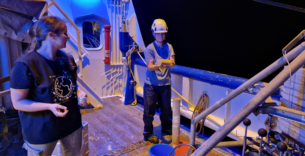 Sediments from the multicore are being sampled on deck