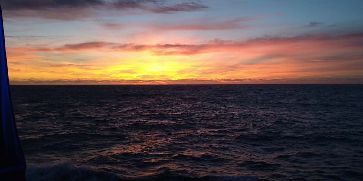 Beautiful sunset over the Atlantic Ocean; the skies turn red because of dust!