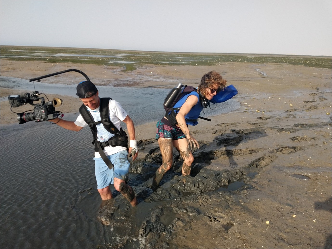 Filmcrew suffering in the mud. Photo: Jan van Gils