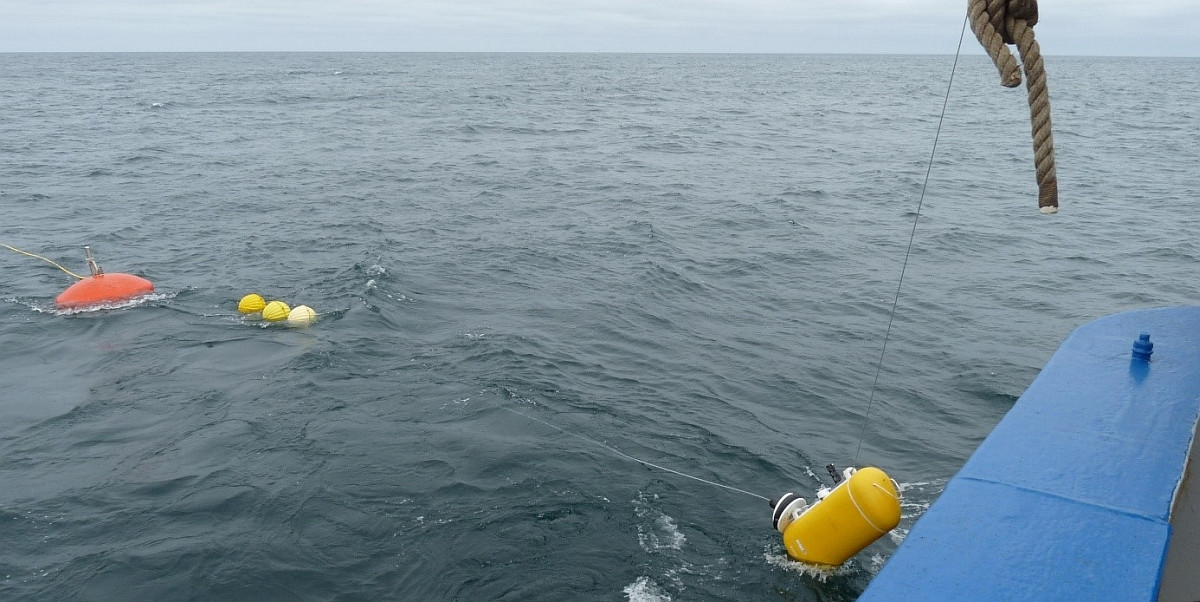 Deployment of the mooring with traveller (lower right)