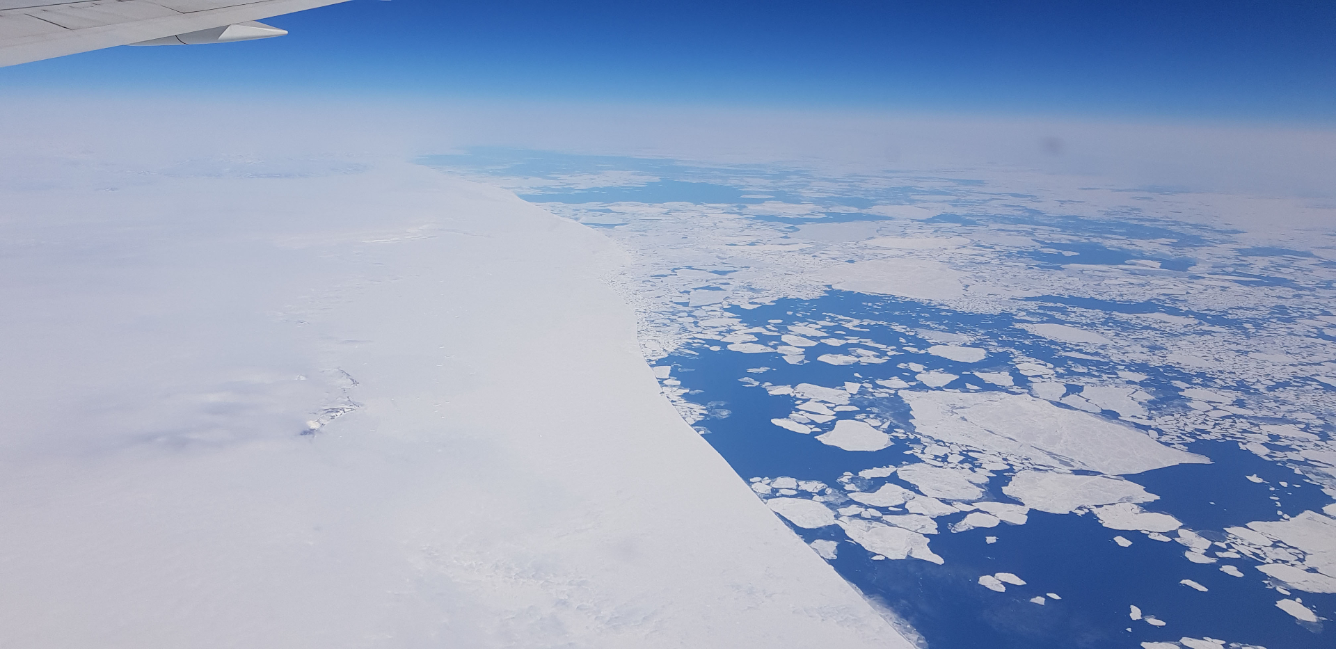 View from the airplane. Melting sea ice around Greenland. . Photo: Clazina Kwakernaak