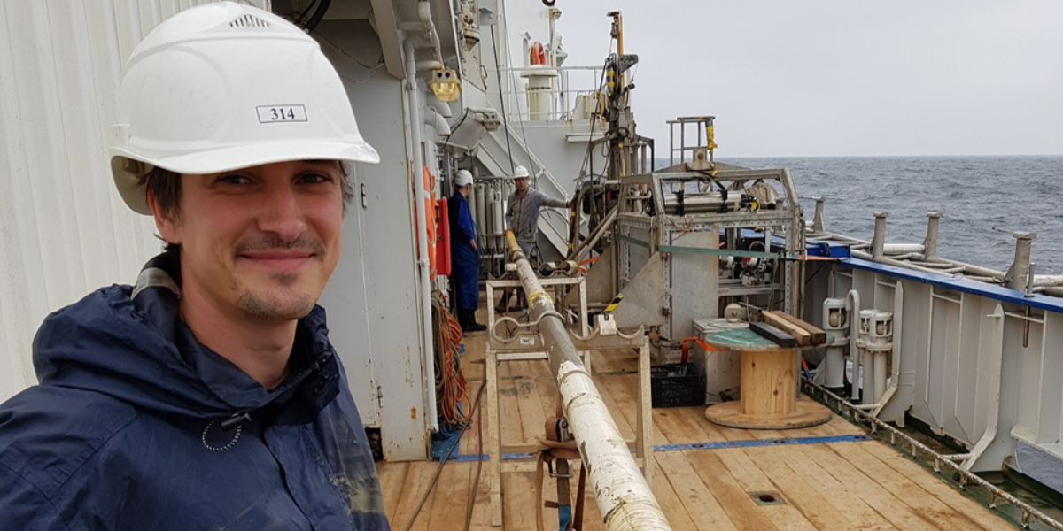 Rick Hennekam with a piston core on board RV Pelagia. Similar long cores will be used for the TIP-TOP project.