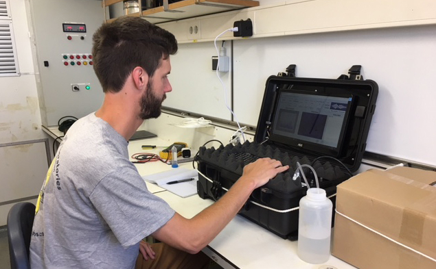 Ethan Edson in one of the labs on the RV Pelagia.