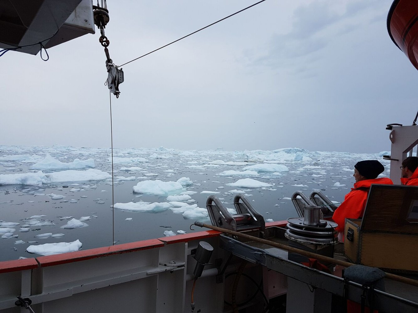Taking samples surounded by ice bergs