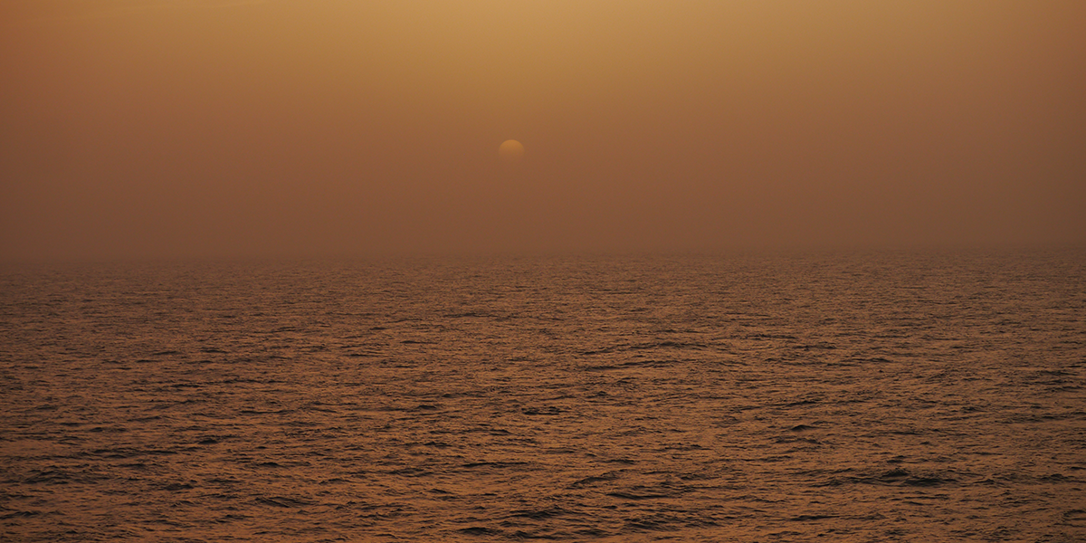 Sunset through Saharan dust, Cape Blanc, Jan-Berend Stuut