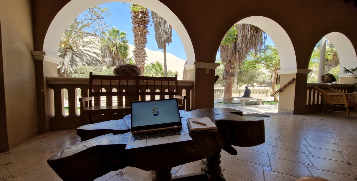 View from the cool shades of the library looking at the scorching hot sands