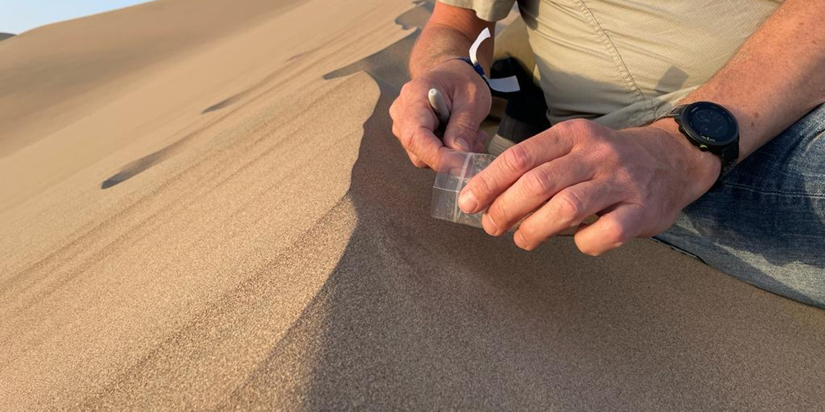 Sampling aeolian transport; particles that 'fly' over the dune (image credit: Catarina Guerreiro)