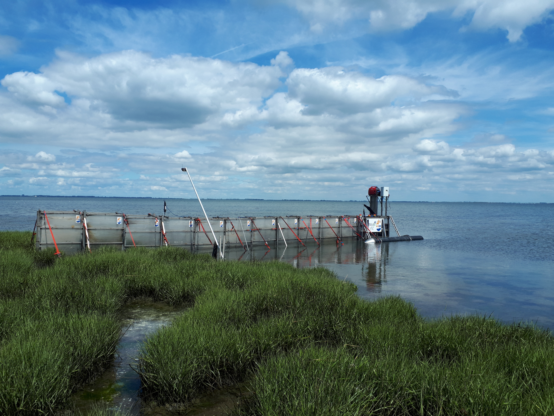 A mobile wave generator is used to study cliff formation at the salt marsh boundary