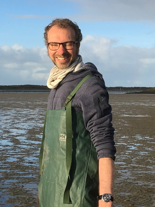 Pierre Offre, lead author of the study, sampling sediments of the Mokbaai on the Island of Texel, where Woeseiales bacteria are also present. Photo credit: Anja Spang, NIOZ