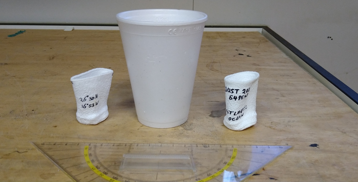 Two of the same Styrofoam cups of which all air was squeezed out at 300bar
