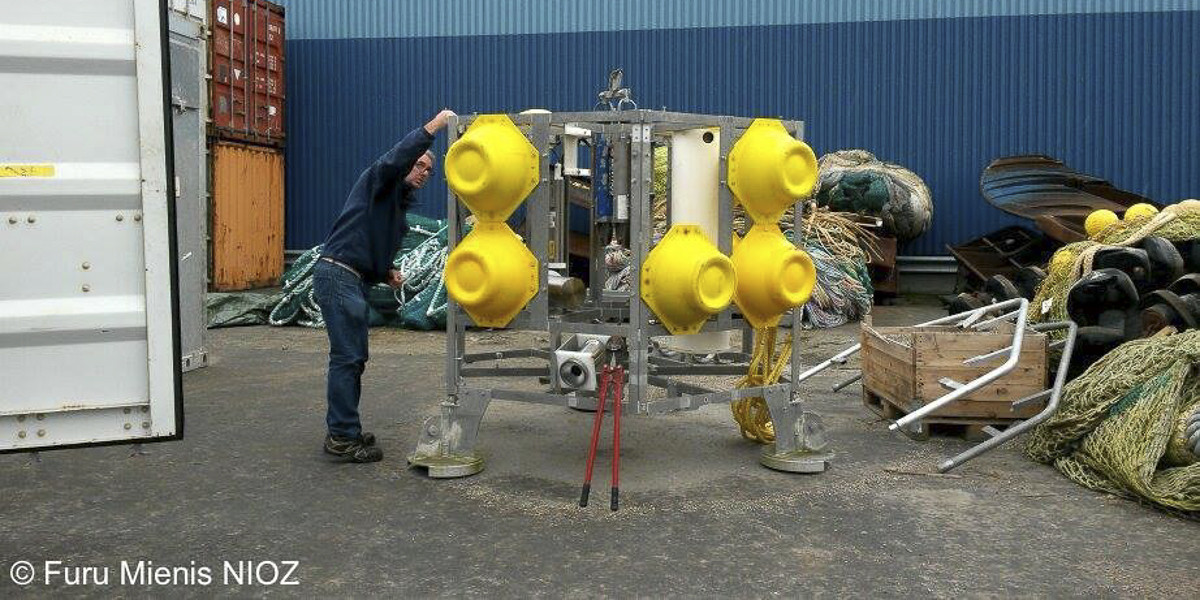 Preparing a lander for deep sea research on Porifera.