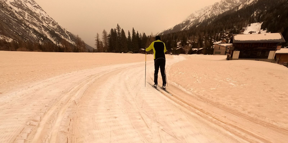 Orange ski tracks in the Swiss Alps on 9 February 2021. Image credits: AP