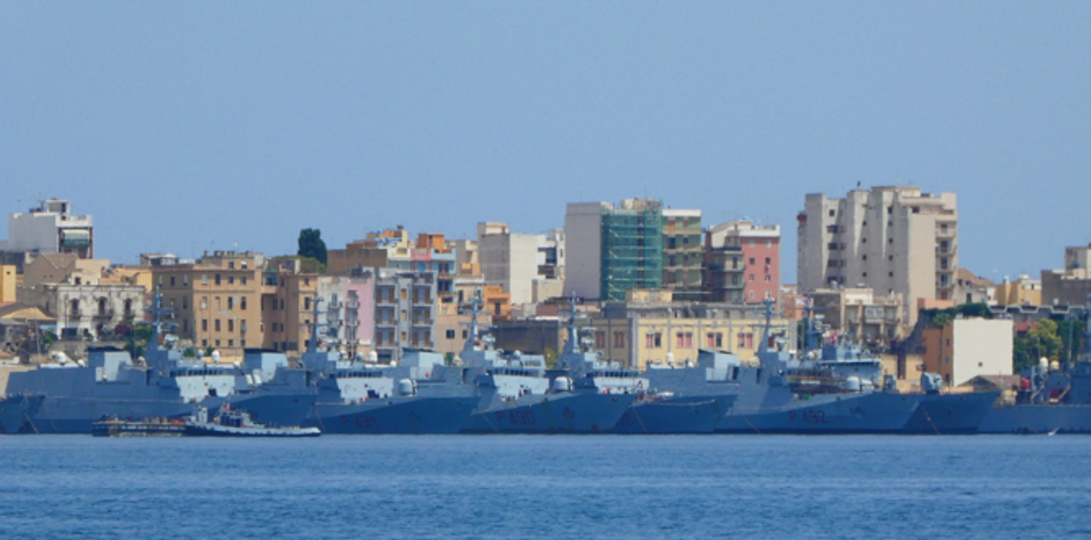 Navy ships in Augusta harbour are more blue than grey.