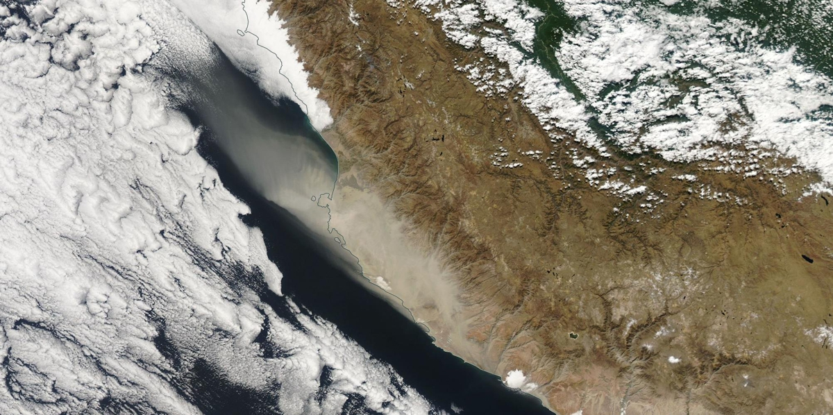 Satellite image showing dust blowing from the Peruvian Desert across Paracas into the eastern South Pacific Ocean. Image copyright: NASA