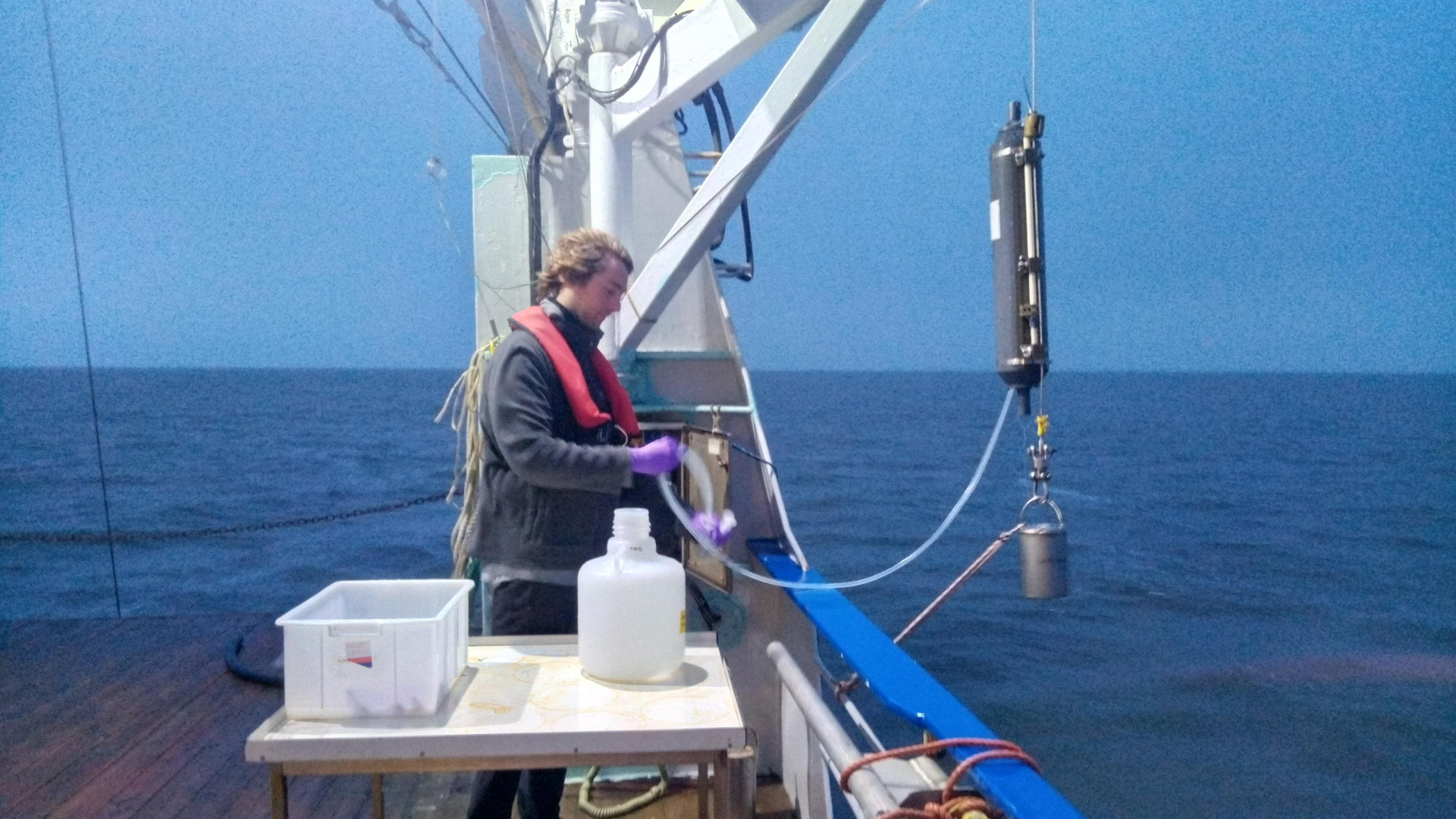 Pierre collecting water early in the morning.Photo: NIOZ, Julia Engelmann