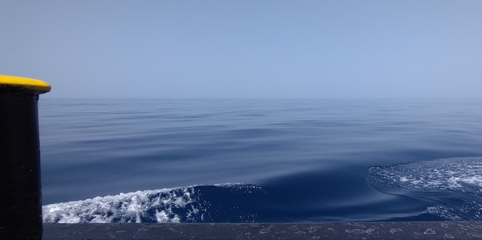 Never before had I seen such a flat ocean surface; as if there is a fat layer of oil keeping the waves down.