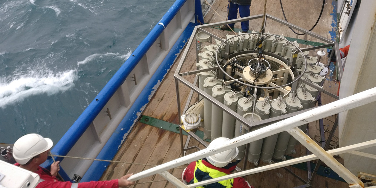 Photo: The CTD just brought back on deck with a full set of water samples. Credit: Rick de Kreij