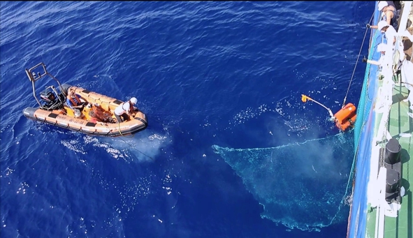 The released instrument is towed towards the ship