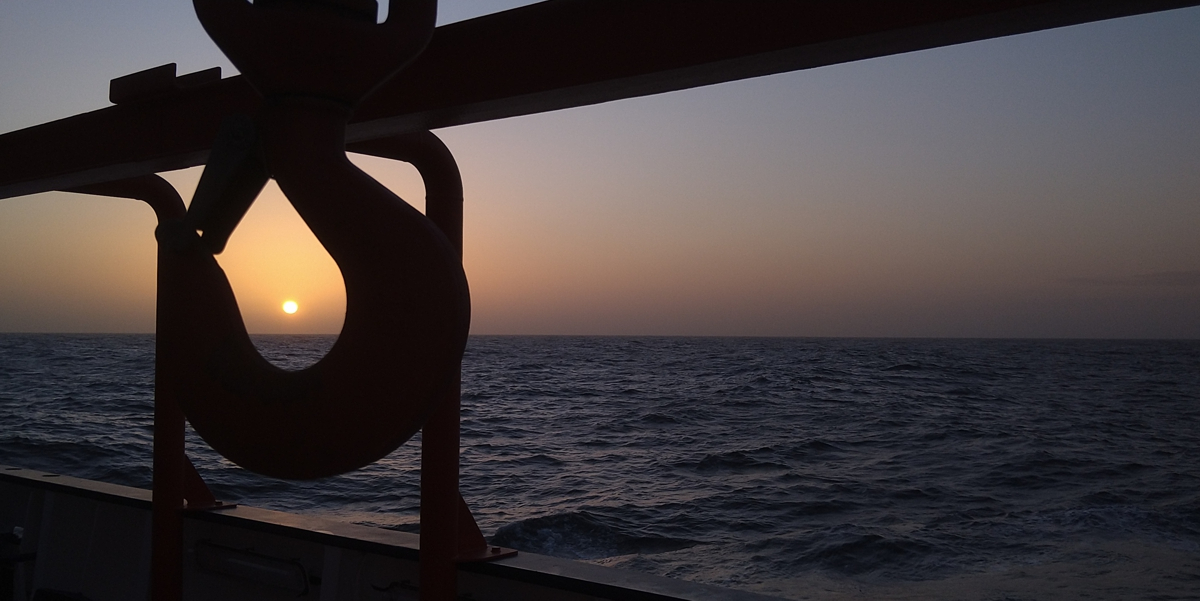 Dusty sunset on deck of RV Maria S. Merian