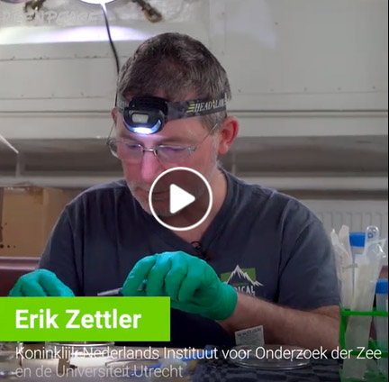 Erik Zettler explains plastics research during Greenpeace Plastic Monster ship tour on Rhine