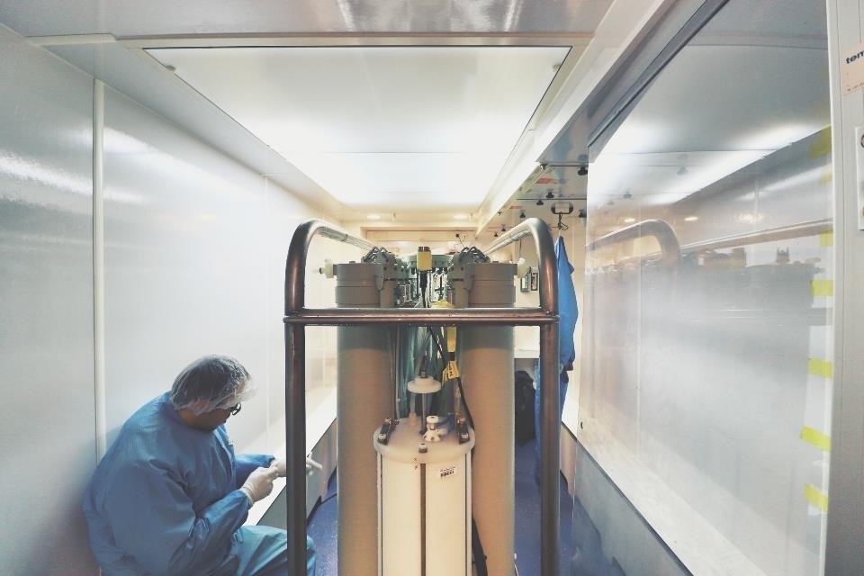 Stanley inside the cleanroom container, ready to take samples from our Titan system.