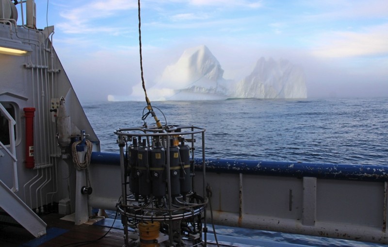 Iceberg on the Greenland shelf, with instrument package in front.