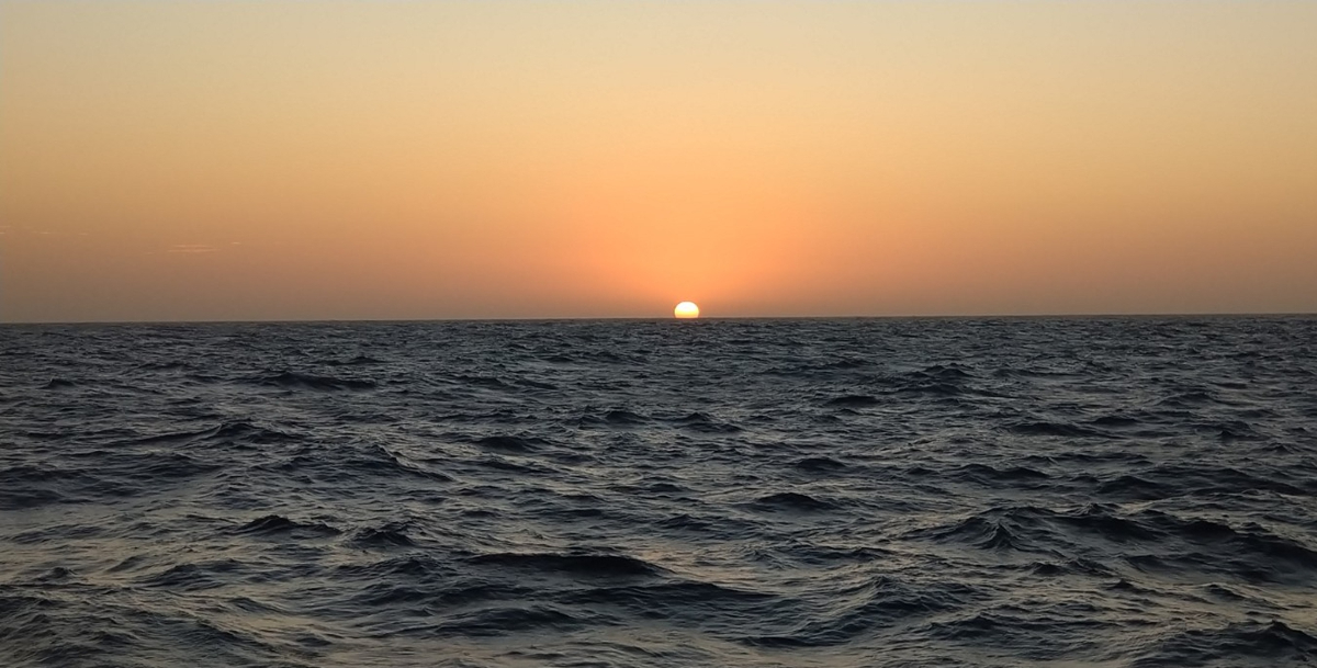Sunsets at sea are usually marvelous, especially when there is dust in the air....