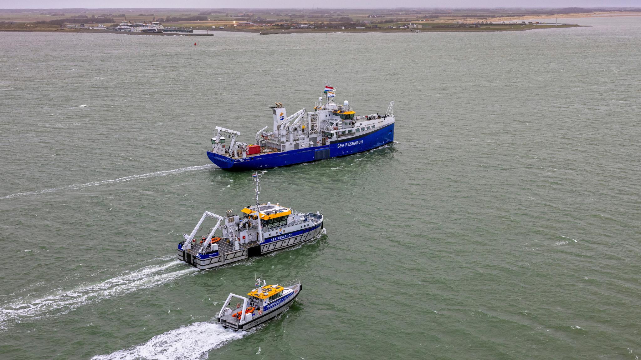 An aerial photo of the complete new NIOZ fleet, taken during the first arrival of the Anna Weber-van Bosse on Texel