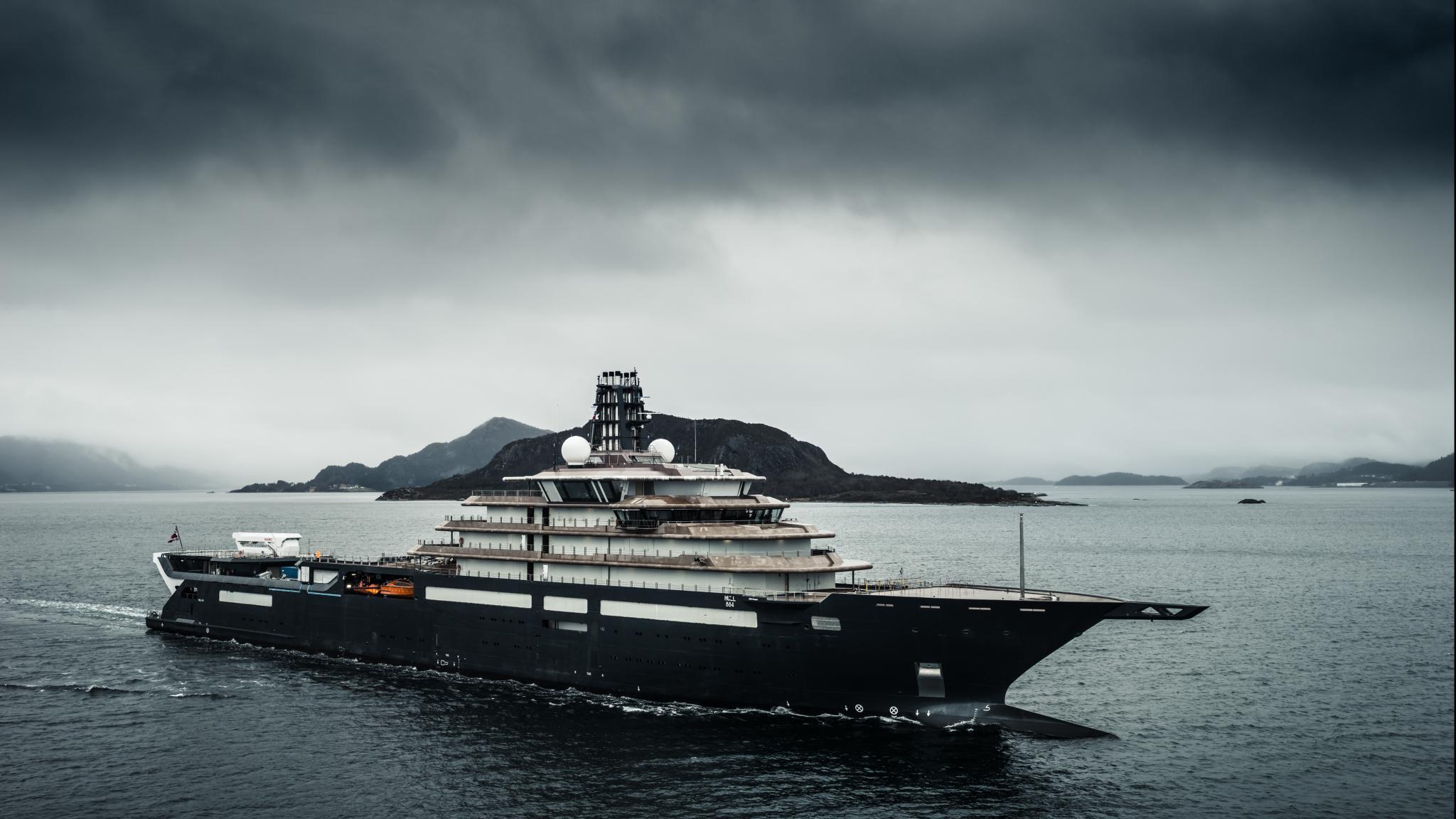a photo of the RV REV Ocean against a black sky backdrop