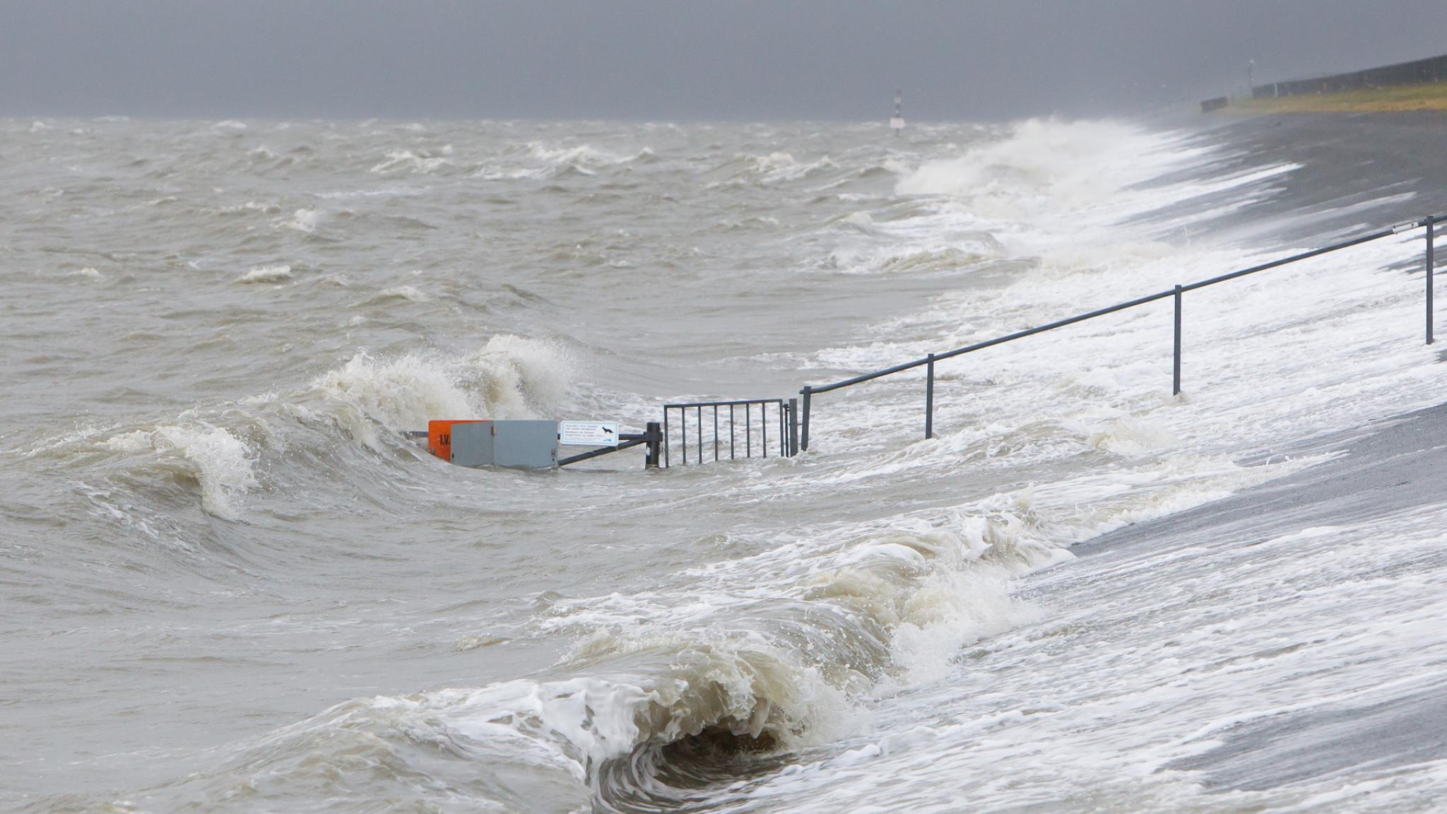 Extreme high tide at the dikes of the dutch coast