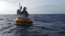 Buoy with equipment floating in the ocean