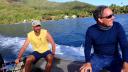 Two men in a speedboat