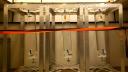 # vertical sampling bottles hanging in a frame