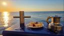 plate in front of sunset