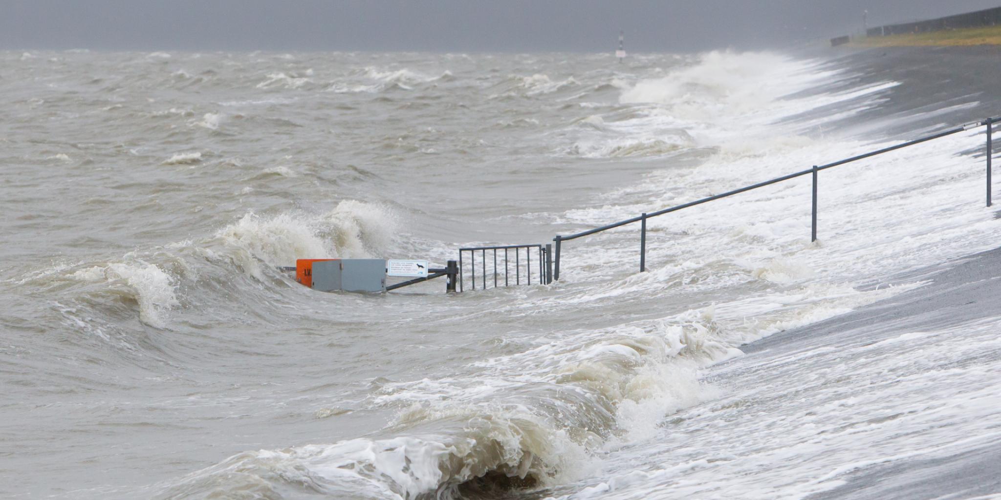 Extreme high tide at the dikes of the dutch coast