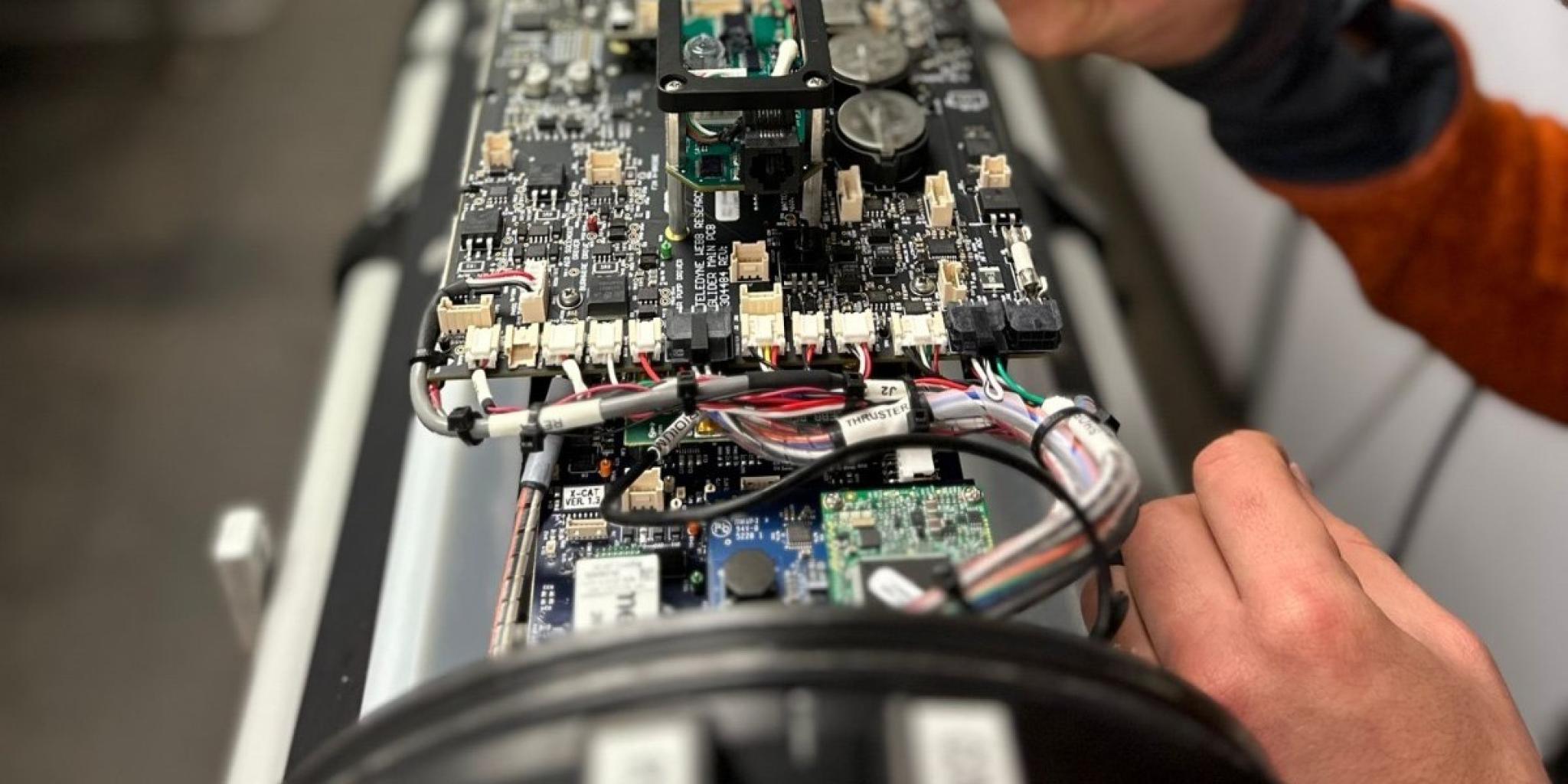 the inside of a glider, showing electronics and printed circuit board