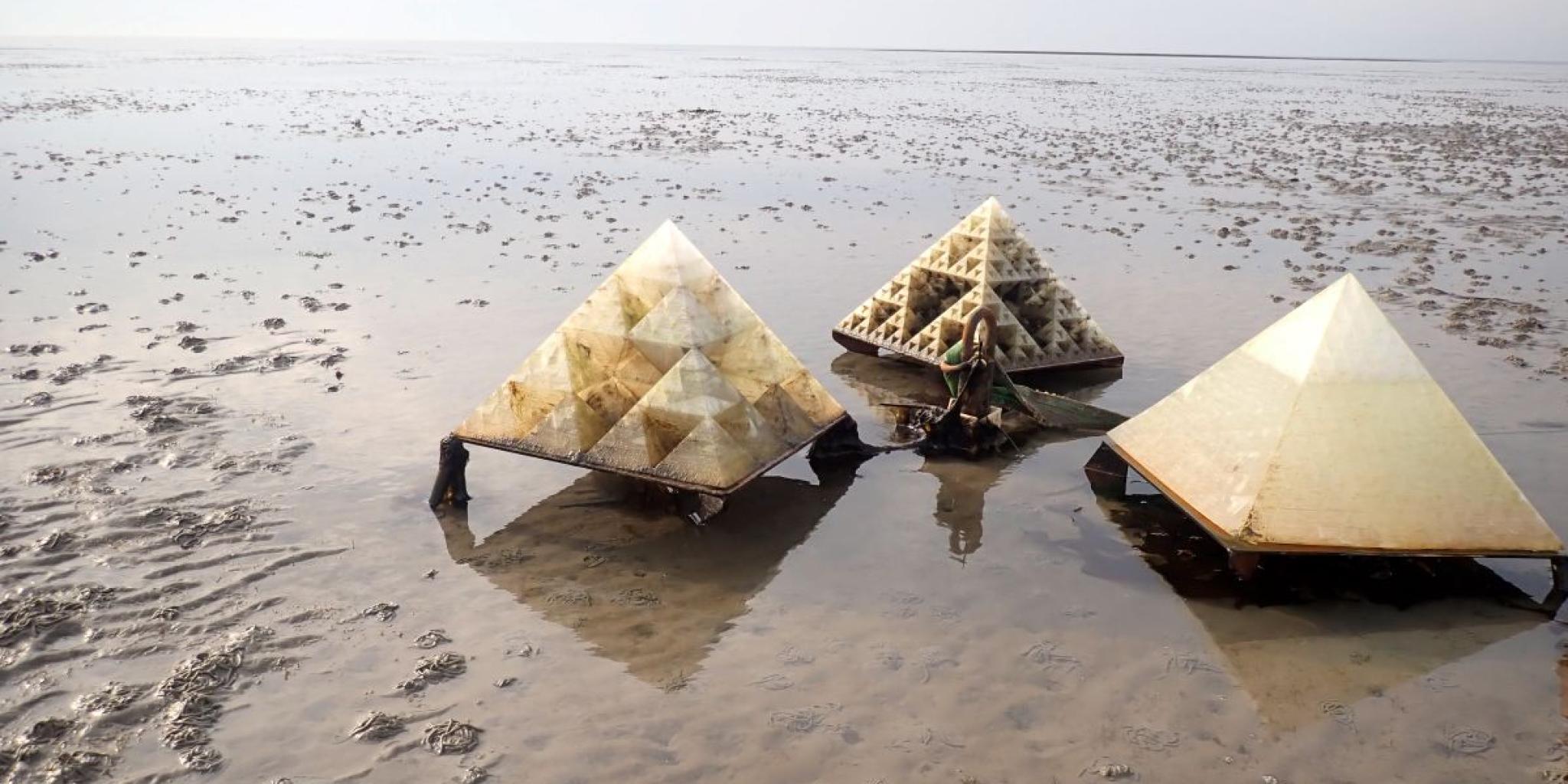 Three pyramid like structures for reef restoration on a mudflat