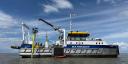 A research vessel installs a yellow pole in shallow water using a crane on deck.
