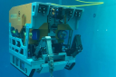The Kystdesign ROV Supporter 6000 under water in a swimming pool. 