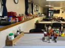 The ship's mess stocked with snacks, sauces and drinks available for the crew throughout the expedition.